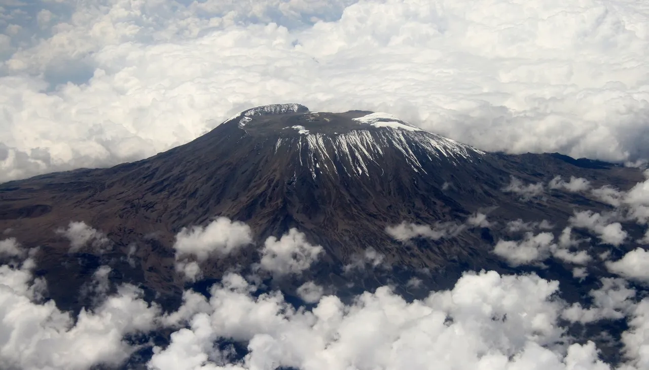 Mount Kilimanjaro — the snow-capped summit rising above the African plains